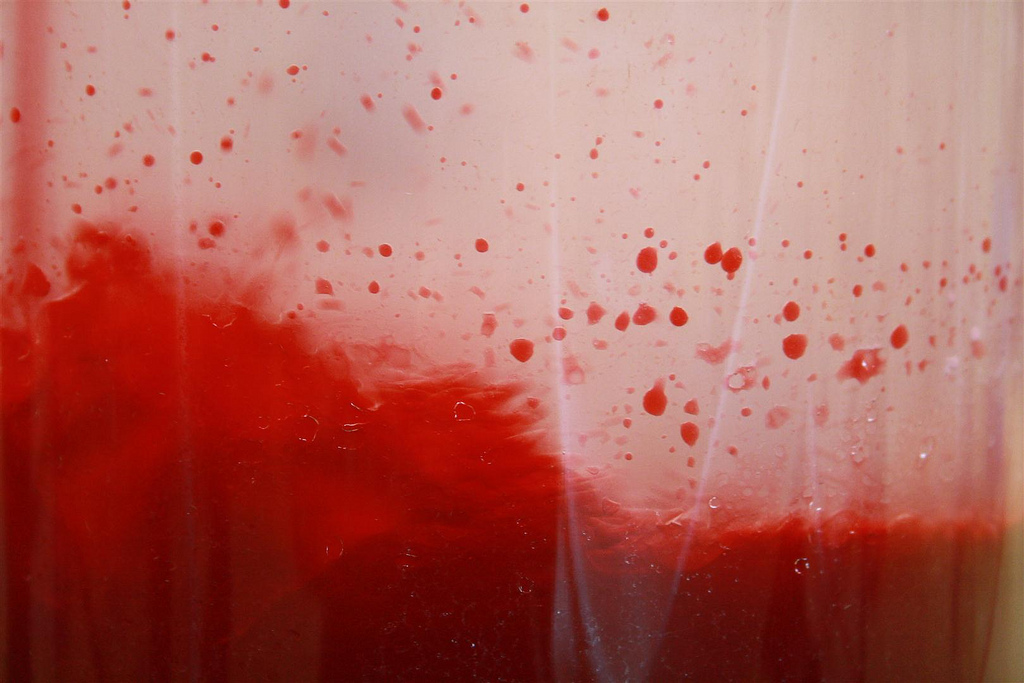 Red liquid bubbling